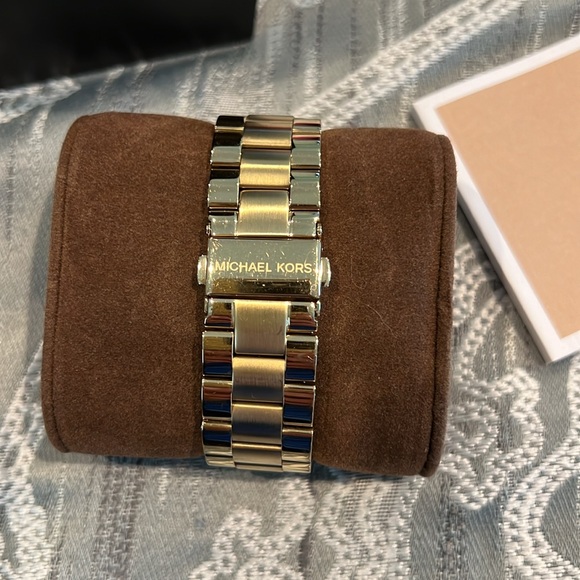 Michael Kors gold watch with blue face. - Picture 4 of 7